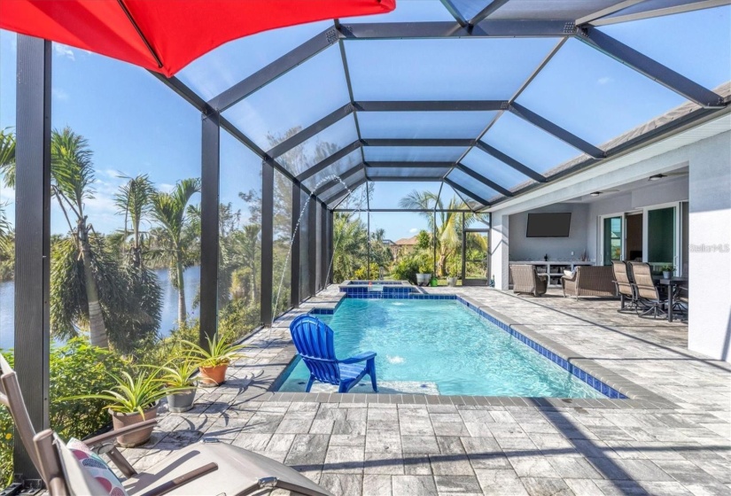 Elegant fountains add a Touch of Luxury and a Calming Ambiance to the Pool