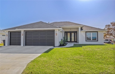 3 Car garage.  Double Entry Doors