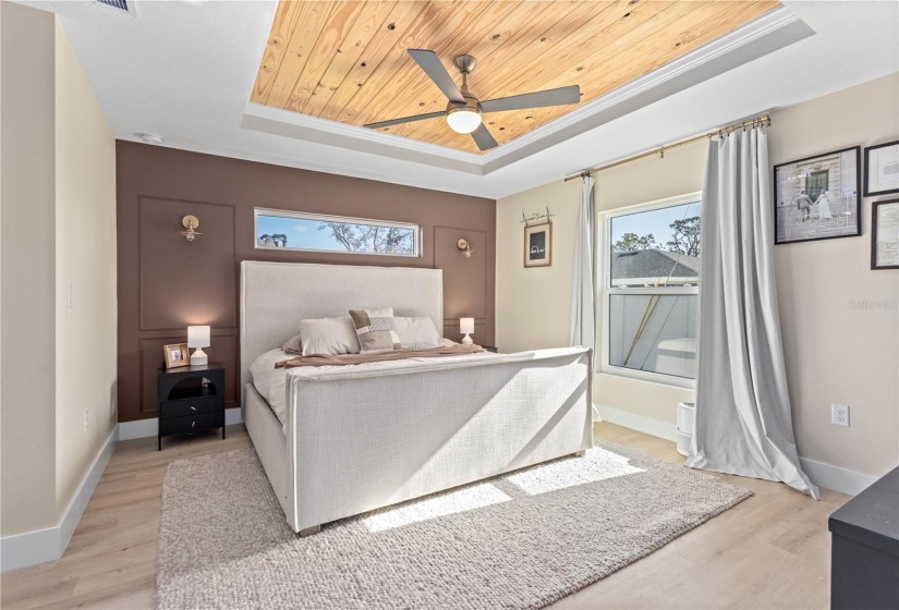 Natural Shiplap Tray Ceiling.  Detailed Custom Wall molding and  light pendants.