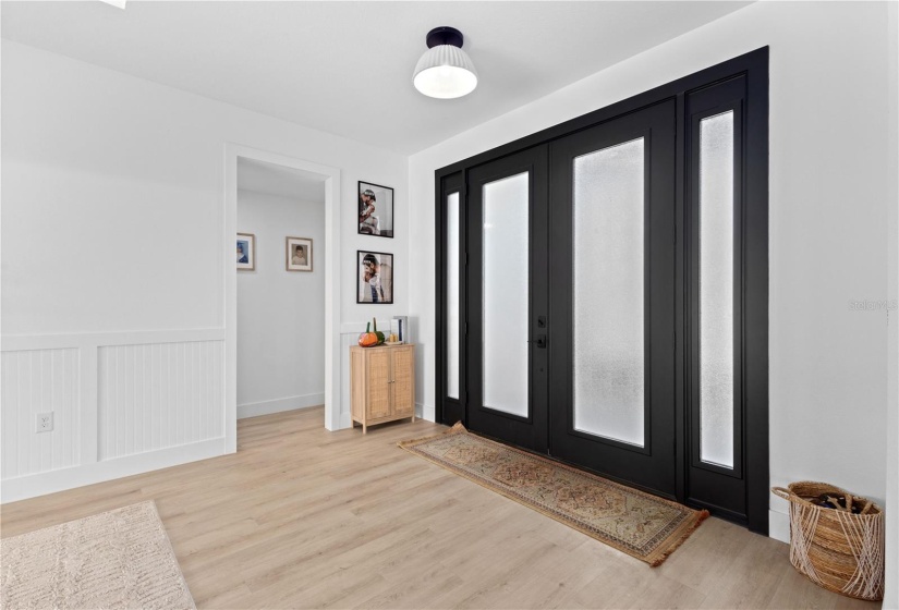 Double Glass Front Doors.  Beadboard wainscoting.