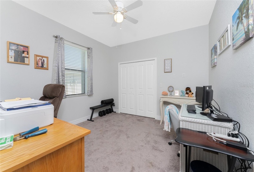 2nd guest bedroom, being used as an office.  Huge walk-in closet, being used as an additional pantry