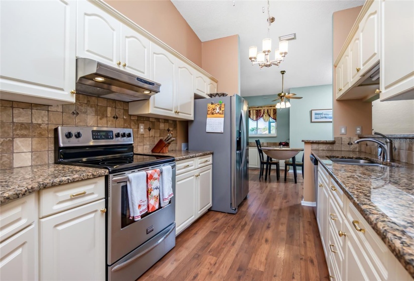 Kitchen with dinette in the background.