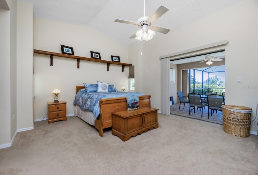 Master bedroom with patio doors to the lanai.