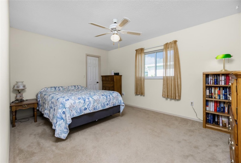 Guest bedroom #1 with large walk-in closet.