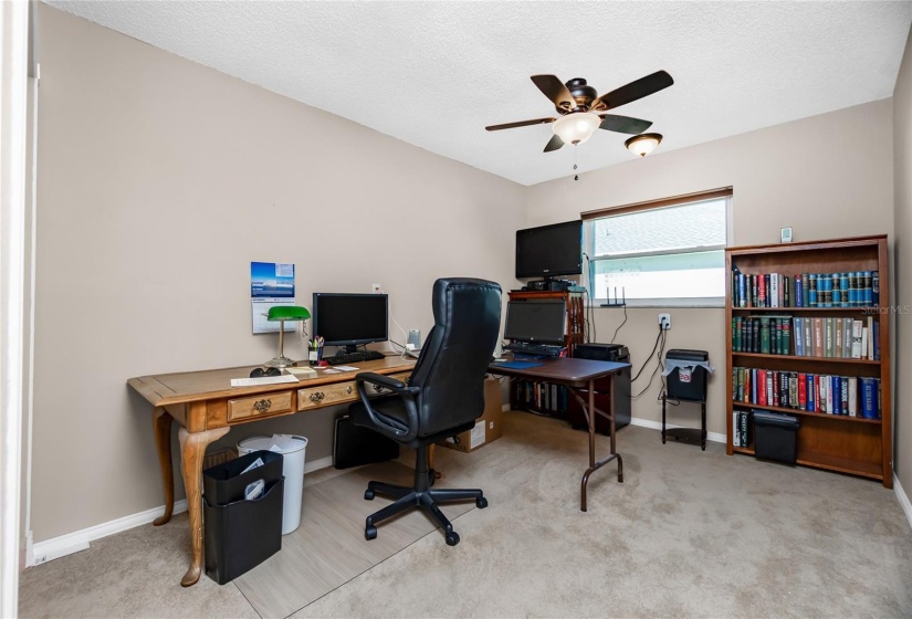 Guest bedroom (#4) / office.  Also has plumbing available for conversion to a large laundry room.