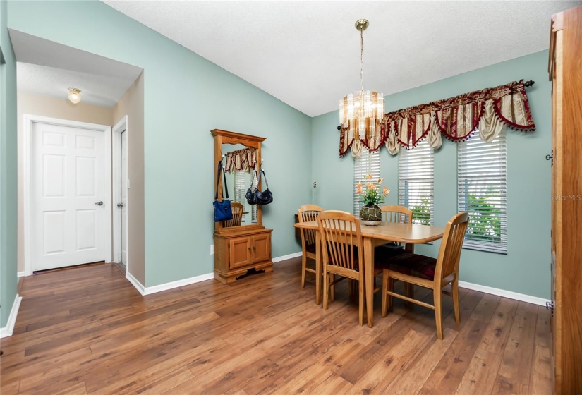 Dining room with hardwood floors.