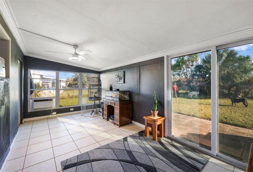 Bonus room with a view to the backyard patio