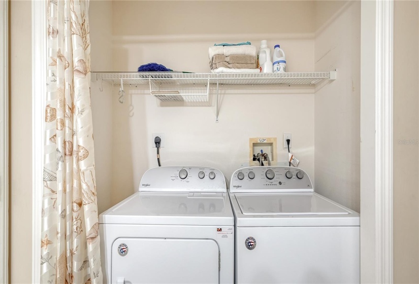 Full sized washer/dryer located in the primary suite