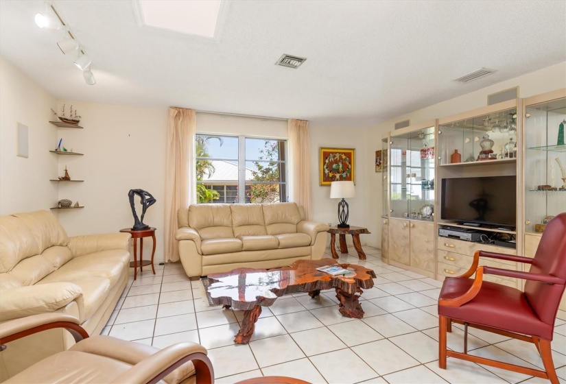 Family room with an abundance of natural light.