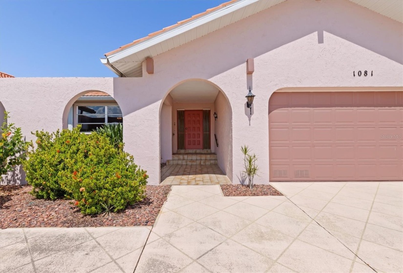 Mature landscaping. Oversized (500+ sq. ft.) two-car garage. Covered entry way.