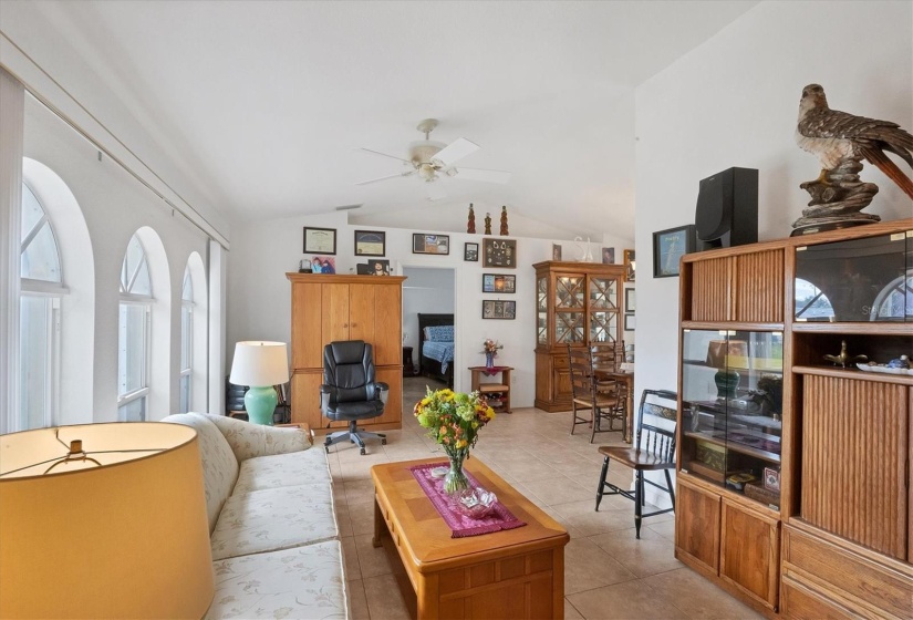 AS YOU ENTER THROUGH THE FRONT DOOR THE FORMAL LIVING ROOM SHOWN HERE IS DIRECTLY TO YOUR LEFT