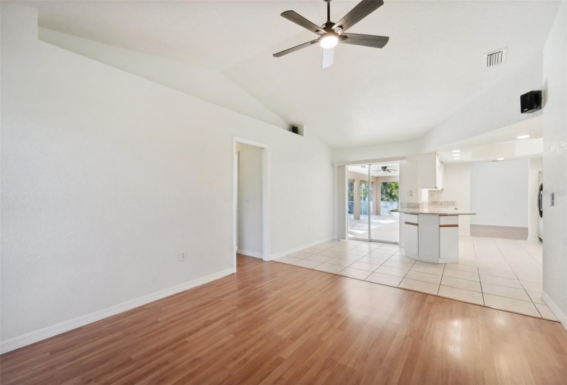 Living Room to the lanai and kitchen view