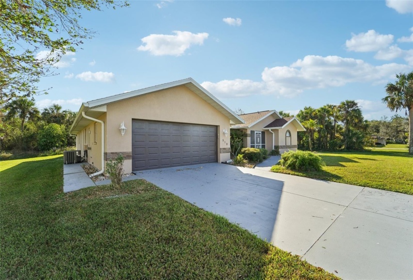 Front left side & driveway view