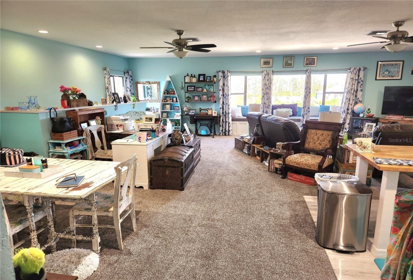 open floor plan upstairs. Carpet and flooring all recently replaced within the past year.  All newly painted, new drapes, cushions, etc.