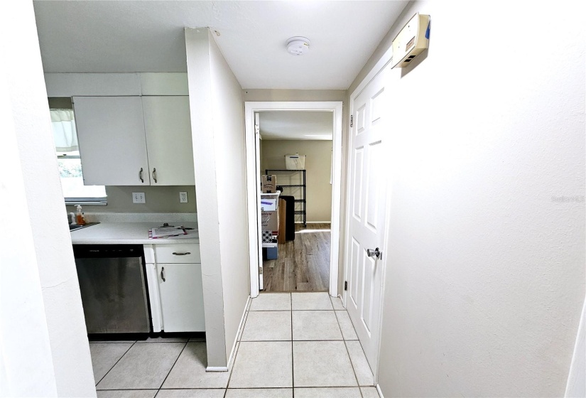 Hallway from garage to guest bath & bedroom