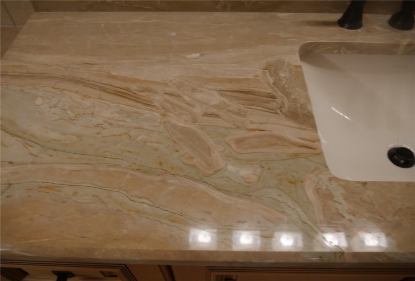 Closeup of one of the Primary bath's marble vanities!