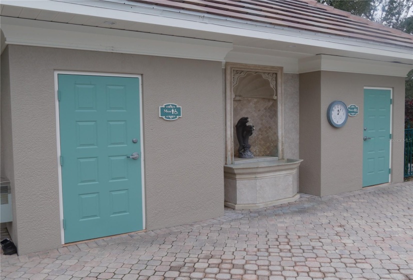 Restrooms with a wall fountain!