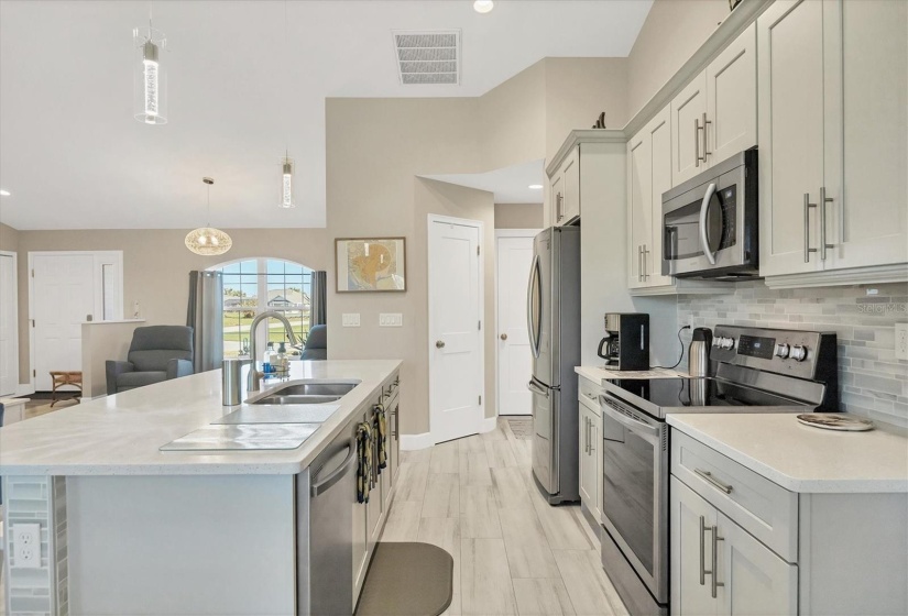 Interior doors provide access to the pantry and garage