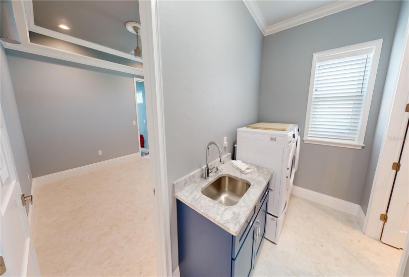 Laundry room off kitchen and bonus room