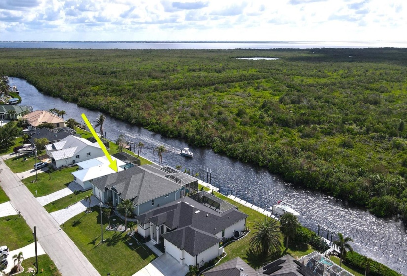 Aerial view of home and waterfront