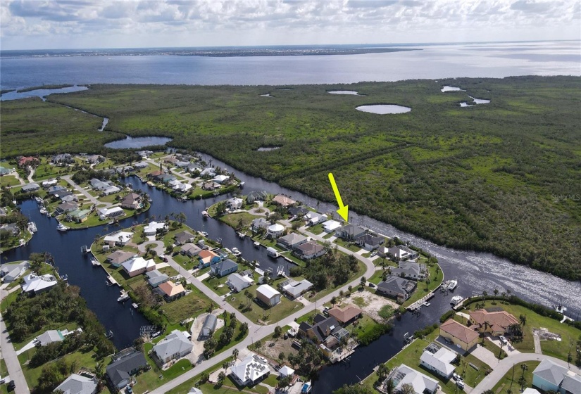 Aerial view of home and waterfront