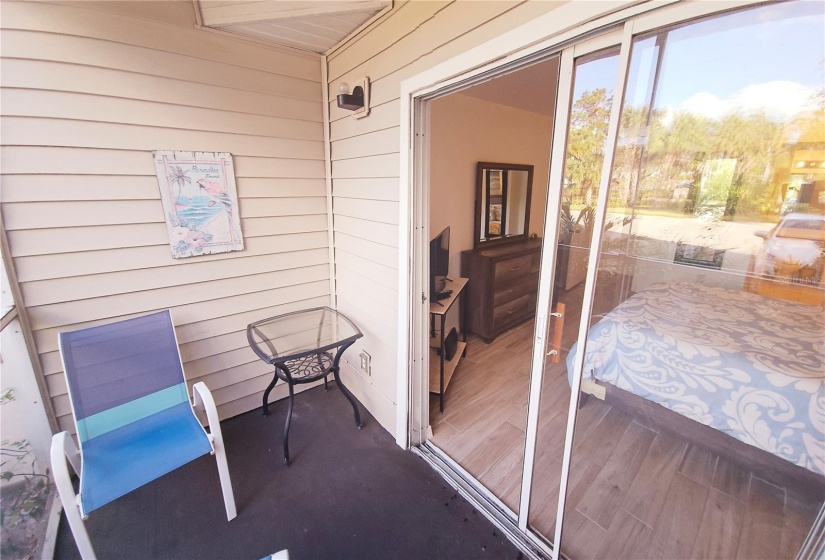 Screened-in lanai off primary bedroom.