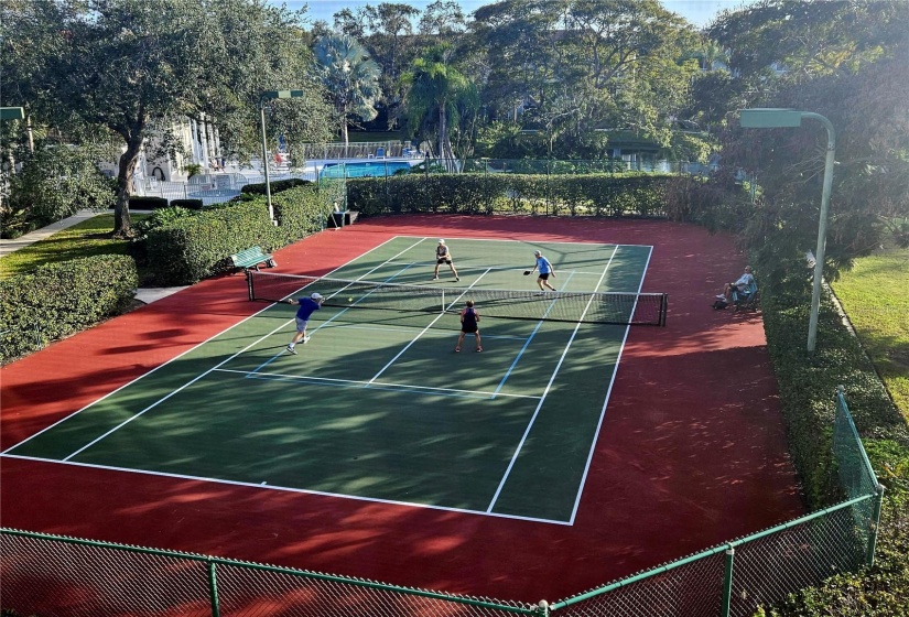 Tennis and pickleball court with lights.