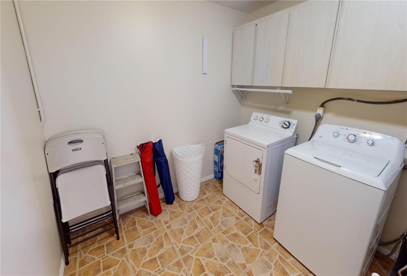 Laundry room off dining area