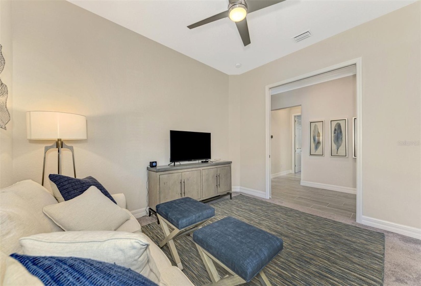 Entry with beautiful tile flooring, front bedroom, Jack and Jill bath, 2nd bedroom used as an office with a sleeper sofa.