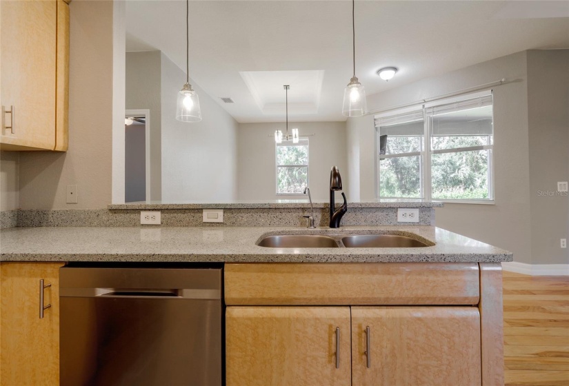 CHEF WON'T MISS A CONVERSATION IN THIS OPEN CONCEPT KITCHEN.