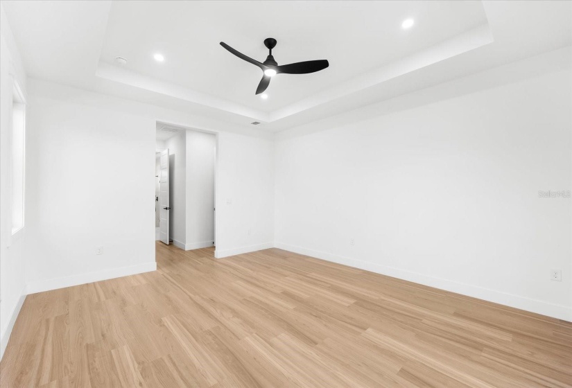 Primary Bedroom Featuring Flooring Throughout