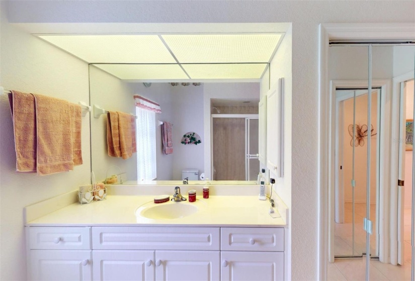 Guest bathroom - view 2 showing the linen closet inside this bathroom.