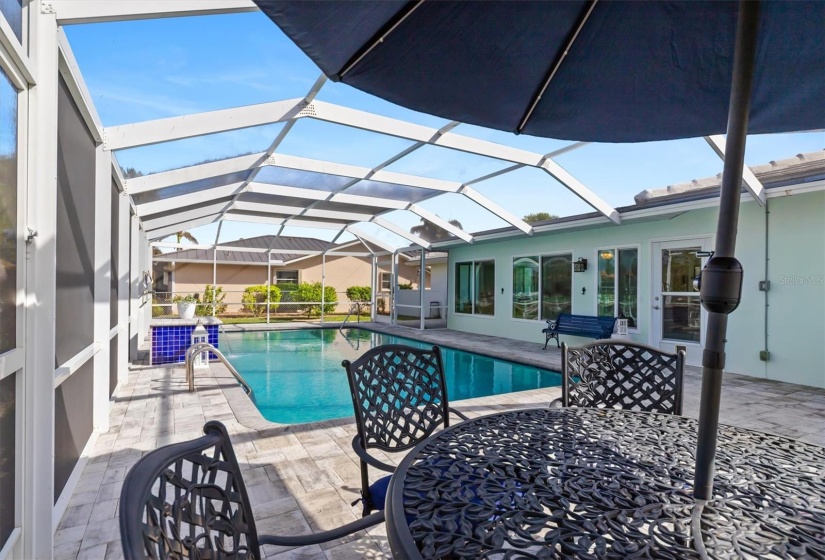 Lots of room for entertaining and sunbathing on this expansive pool deck.