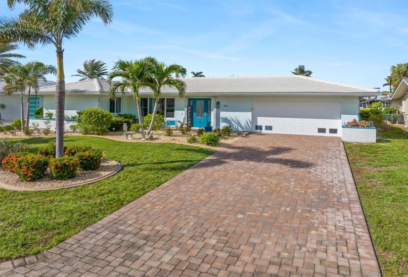 New paved driveway. Tile roof.