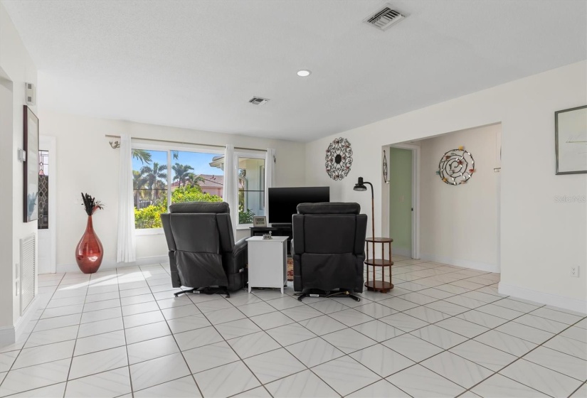 View from living/dining area towards Primary Suite to the rear right.