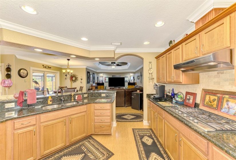 Kitchen centrally located in the split design, Master to the left, two quest bedrooms to right