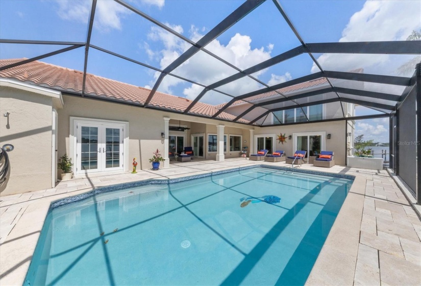 Remodeled pool with custom mermaid tile