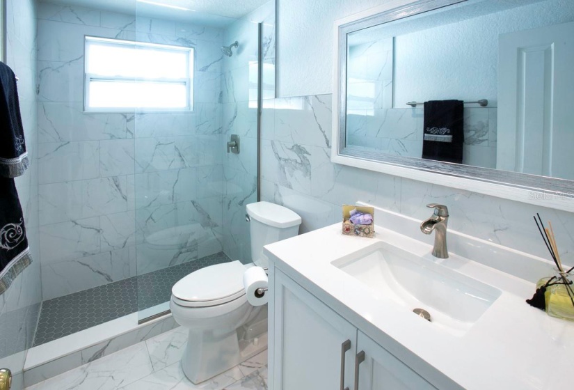 Beautiful hall bath remodel needs cabinets