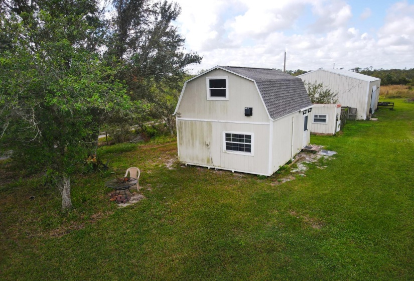 Aerial view guest house, chicken coop and barn