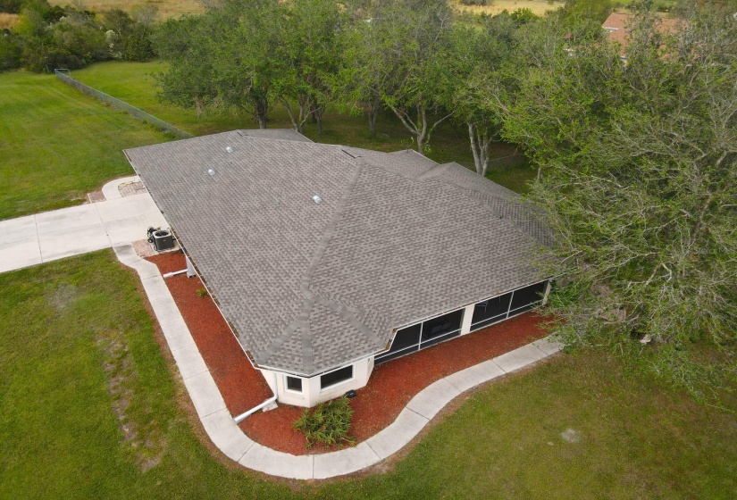 Aerial south and east exterior and parking pad