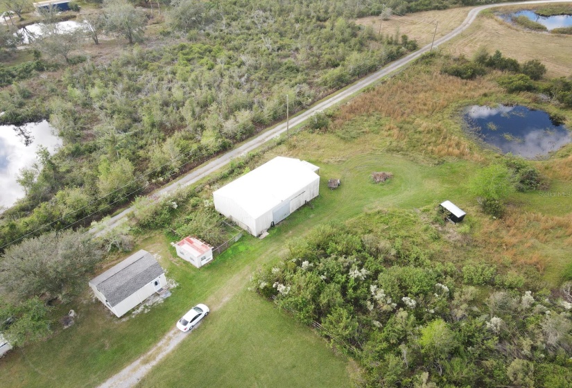 Aerial of guest house, chicken coop and barn