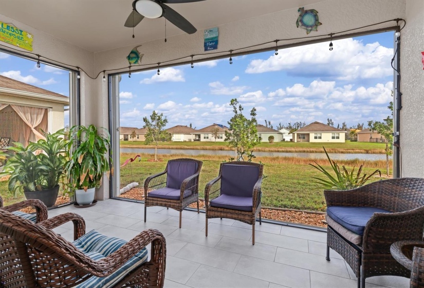 Lanai has tiled floor, unobstructed views of the pond