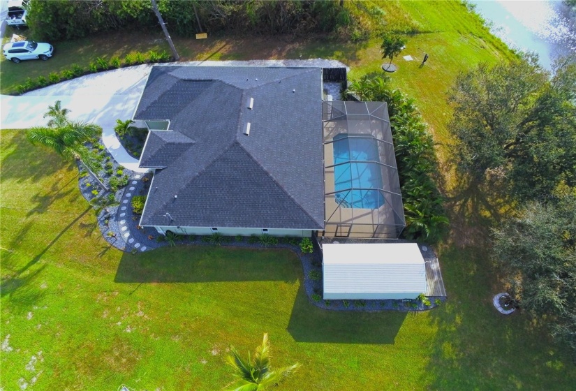 Areal view of pool on the right side of home