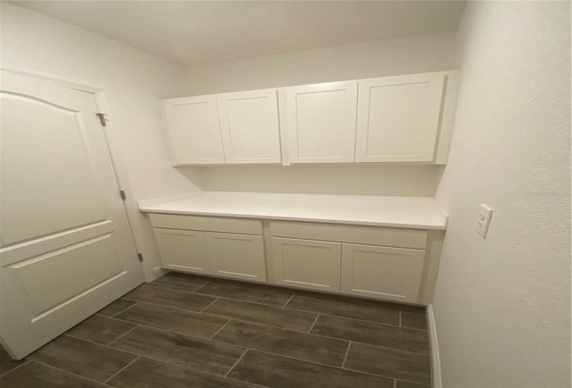 Laundry room counter & built-in cabinets