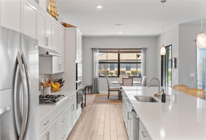 Kitchen cabinetry provides an abundance of storage space