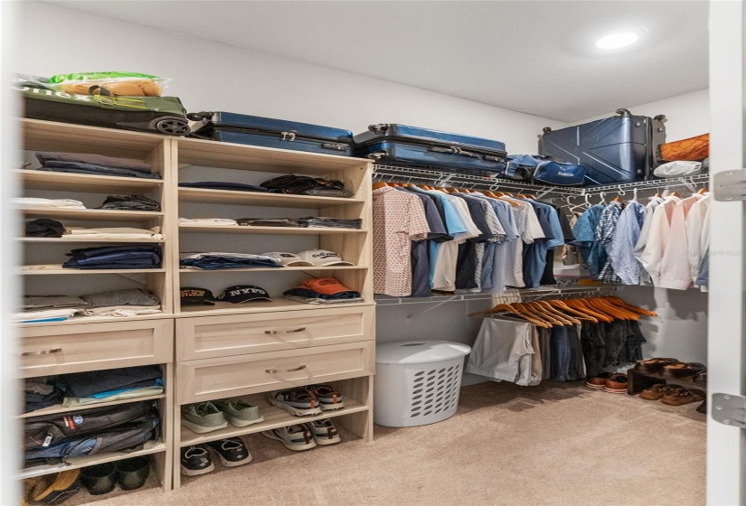 1 of 2 Walk-in Closets in Primary Bedroom