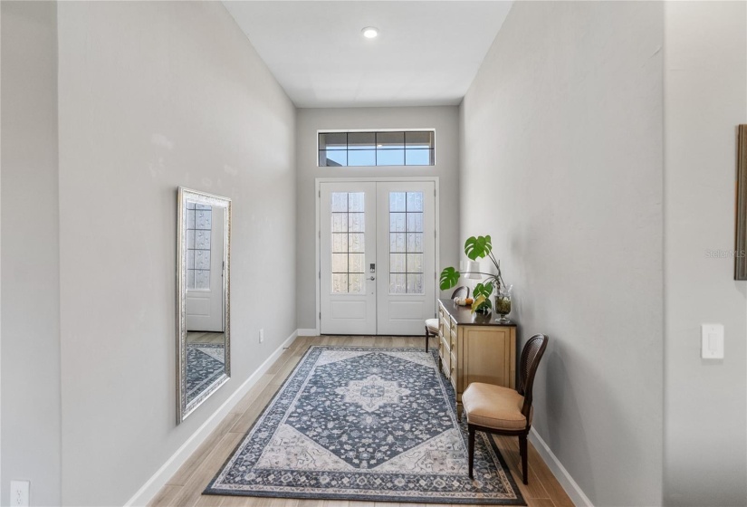 Beautiful 12' walls and ceiling upon entering the home