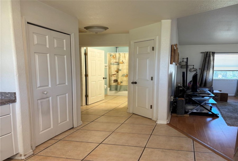 Broom closet & hallway to 2nd & 3rd bedrooms