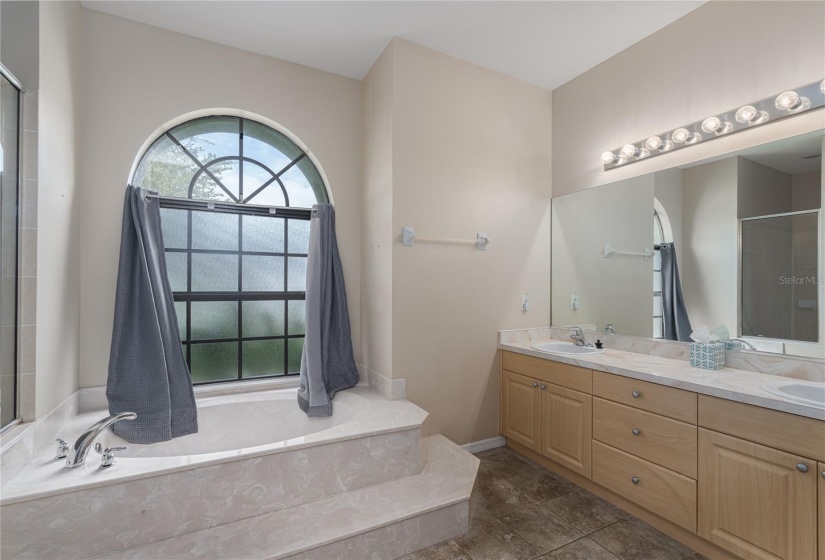 3311 46 Street East Palmetto FL 34221 MLS # A4623662 Sugar MillPrimary bath with soaking tub, double sinks and separate shower