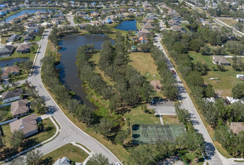 Community amenities include tennis court, half basketball court, and playgrounds